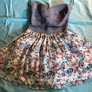 A strapless blue/flower dress